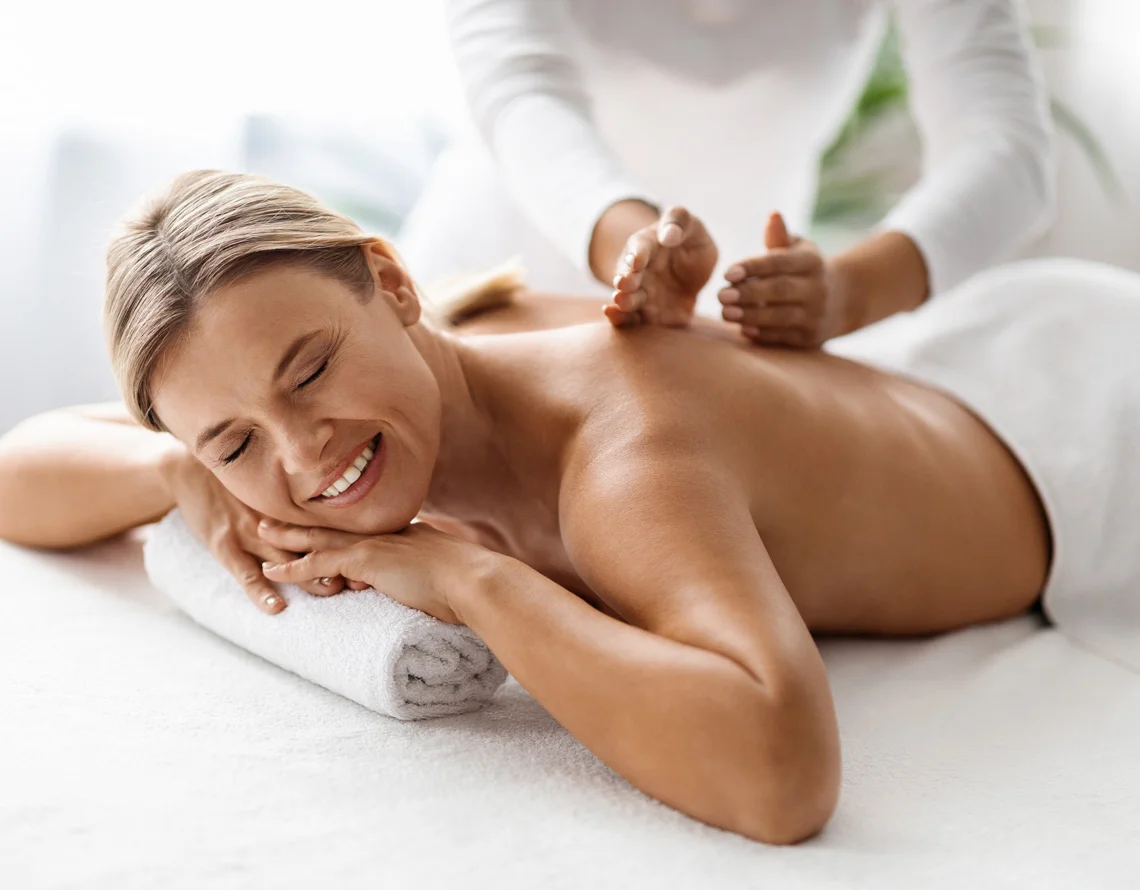 Therapist performing a relaxing massage at Ira Spa