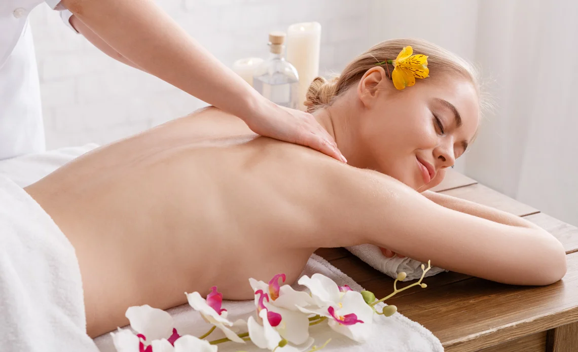 Therapist performing a relaxing massage at Ira Spa